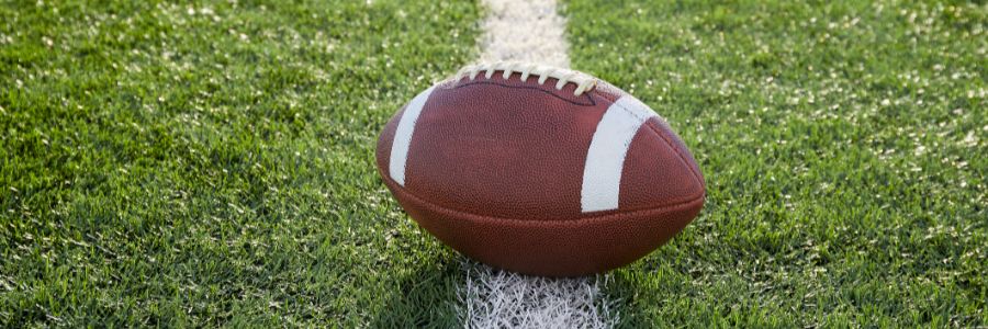 NFL ball on the pitch